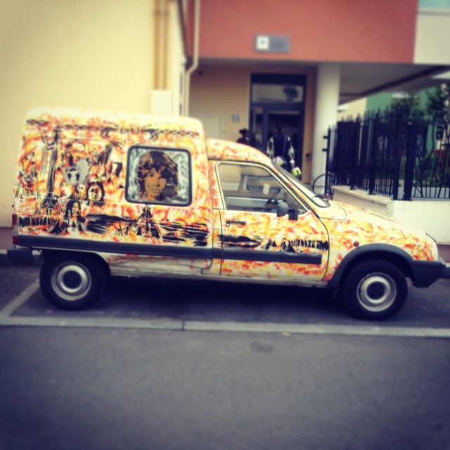 I see this car every day. It's got Hendrix on the other side. Totally rad, dude